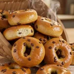 Delicious Golden Brown Chocolate Chip Bagels in Basket
