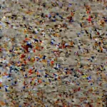 An extreme close-up of a spoonful of creamy chicken and rice casserole, showing the tender chicken and perfectly cooked rice.