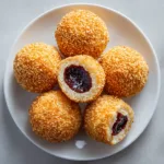Golden fried sesame balls filled with sweet adzuki bean paste, a popular use for this recipe.