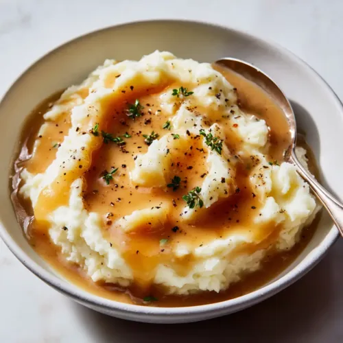 Copycat KFC Gravy: The Ultimate Homestyle Savory Sauce and Potatoes