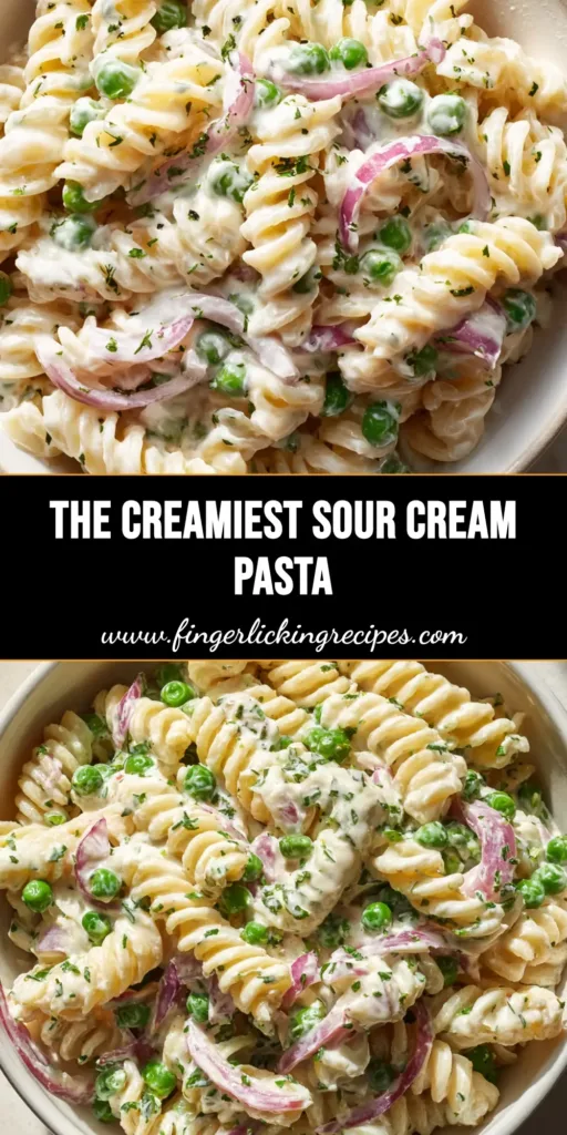 A close-up of Sour Cream Pasta Salad in a white bowl showing rotini spirals coated in thick white dressing with green peas and red onions. (Sour Cream Pasta Salad)