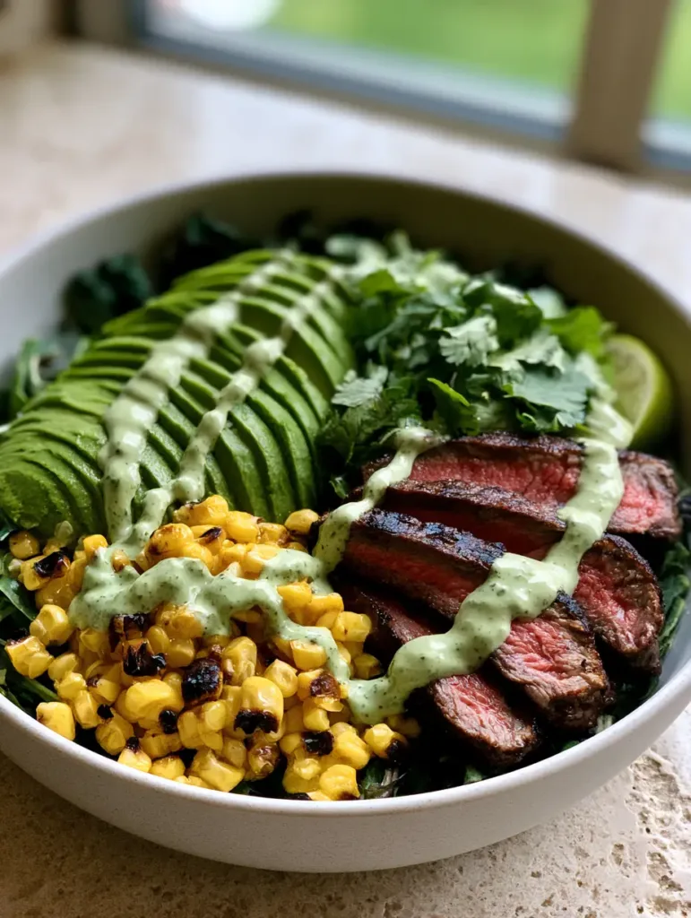 Handheld photo of a Whole30 Steak and Avocado Bowl in a matte white ceramic dish showing charred corn and medium-rare steak.